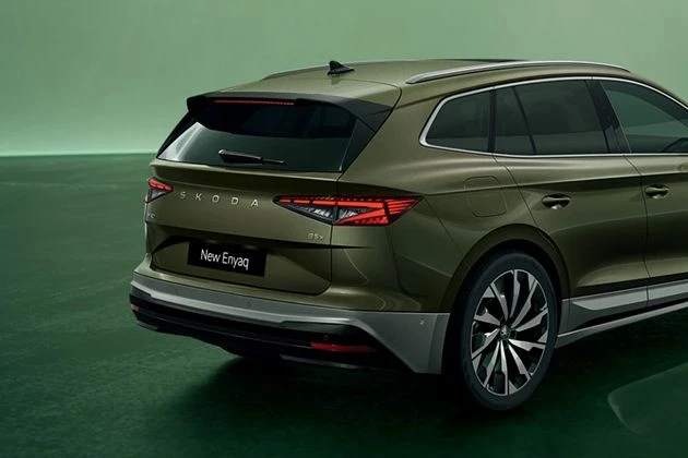 Bold rear bumper and narrow C-shaped headlights